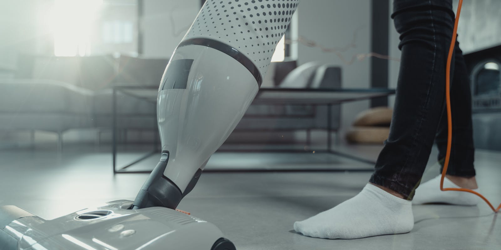 someone vacuuming the floor