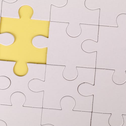 Olive drab green insulated bottle with flared screw lid and flat top.